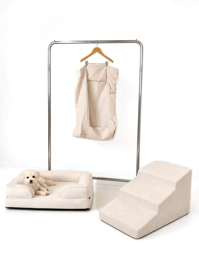 Kumo bed, Sora stairs and a spare cover in Cream with a white poodle