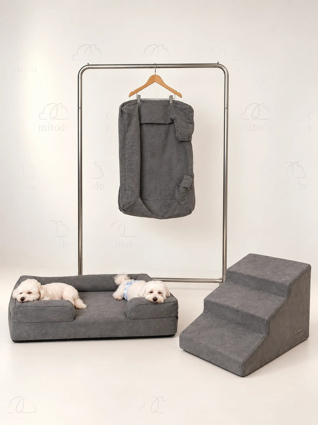 The Mitodo Complete Set in Charcoal Gray: Kumo bed with two dogs, Sora stairs, and the spare cover on a hanger