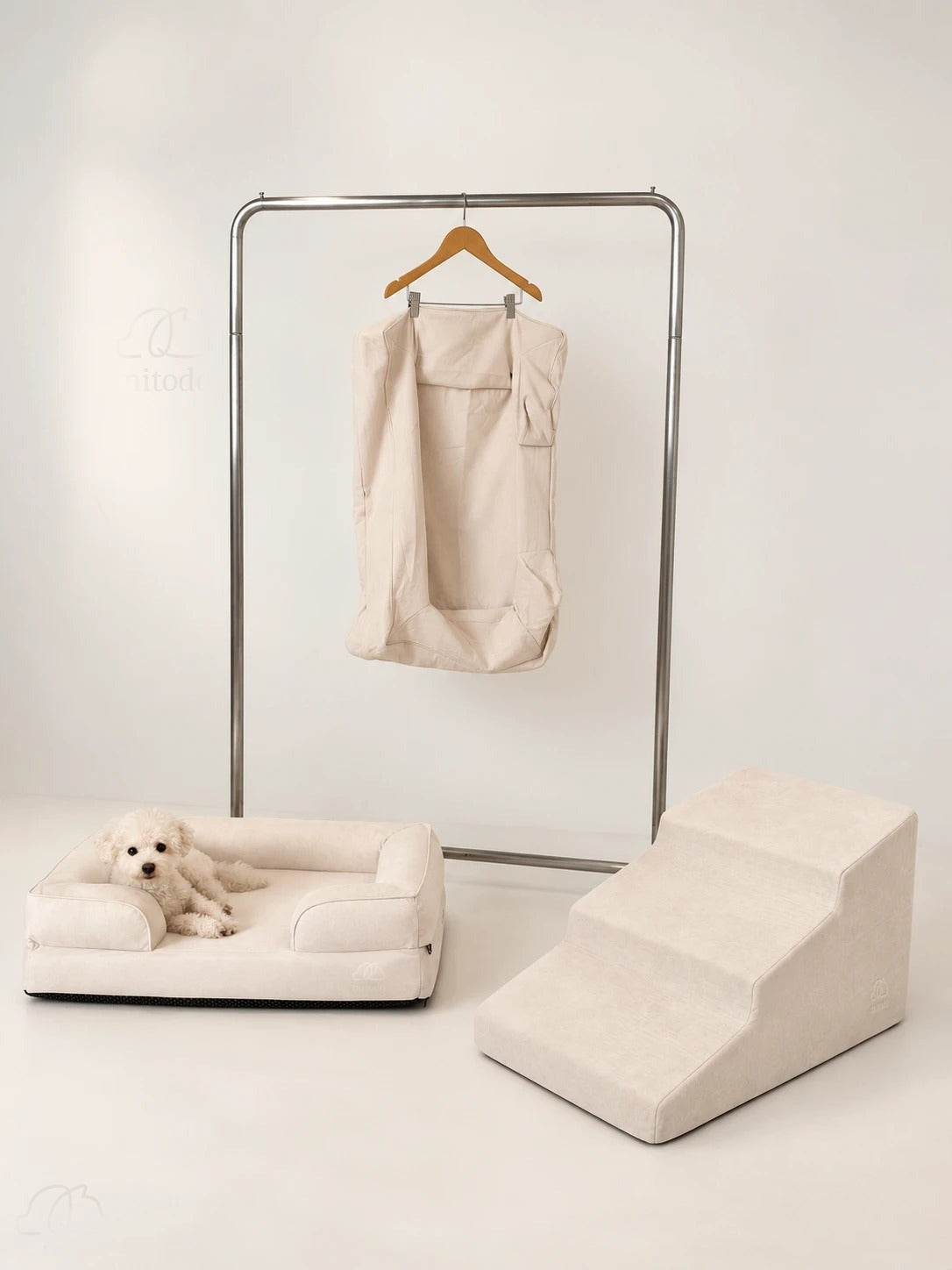 The Mitodo Complete Set in Cream: Kumo bed with a dog, Sora stairs, and the spare cover on a hanger
