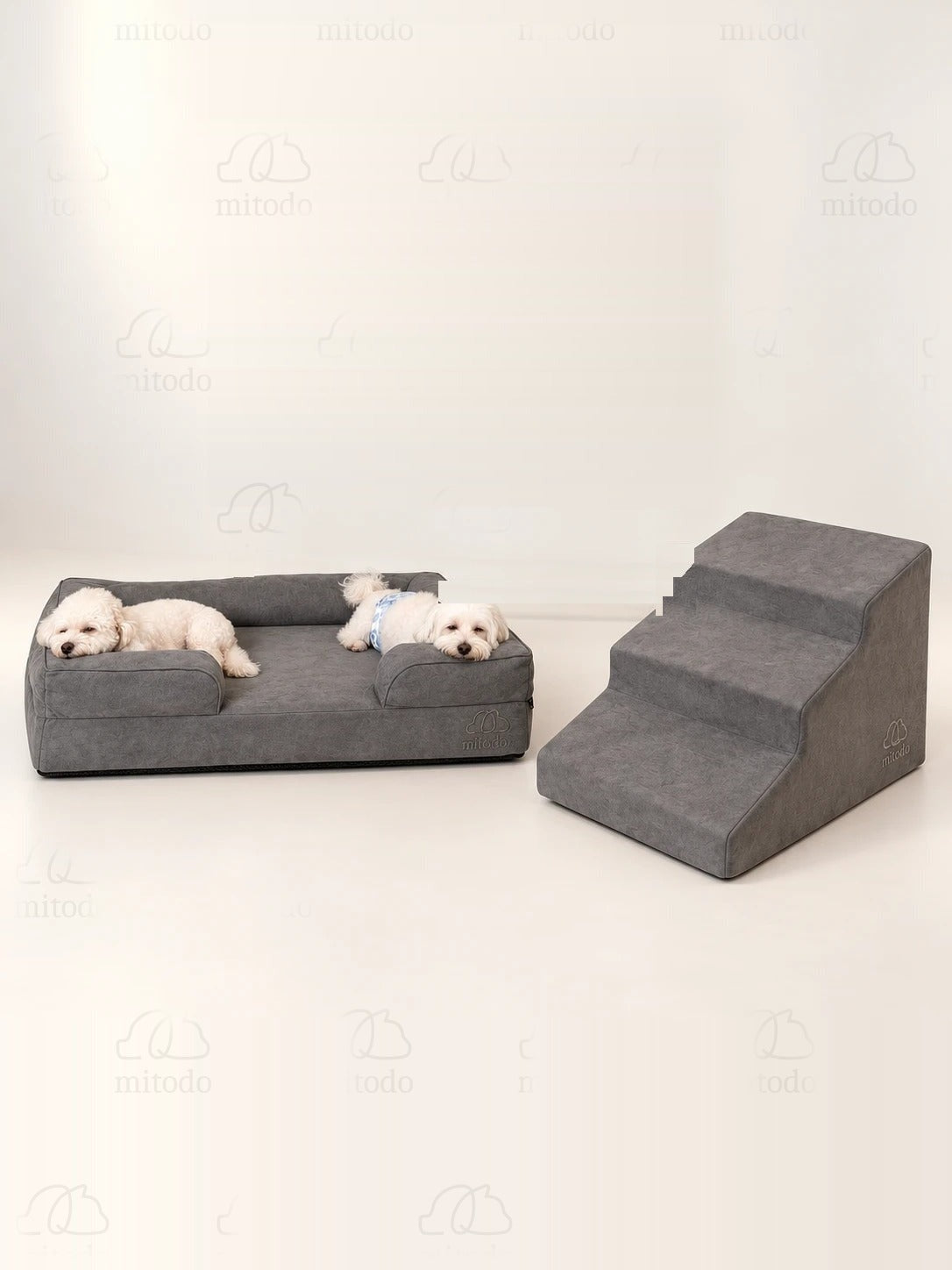 Kumo Bed + Sora Stairs Set in Charcoal Gray: Kumo orthopaedic bed with two dogs resting, Sora pet stairs beside it