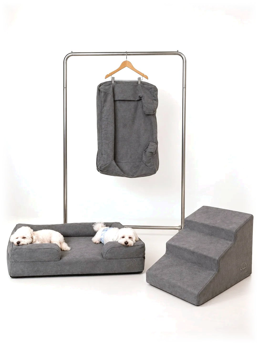 The Mitodo Complete Set in Charcoal Gray: Mitodo Kumo bed with two dogs, Sora stairs, and the spare cover on a hanger