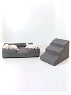 Mitodo Kumo Bed + Sora Stairs Set in Charcoal Gray: Kumo orthopaedic bed with two dogs resting, Sora pet stairs beside it