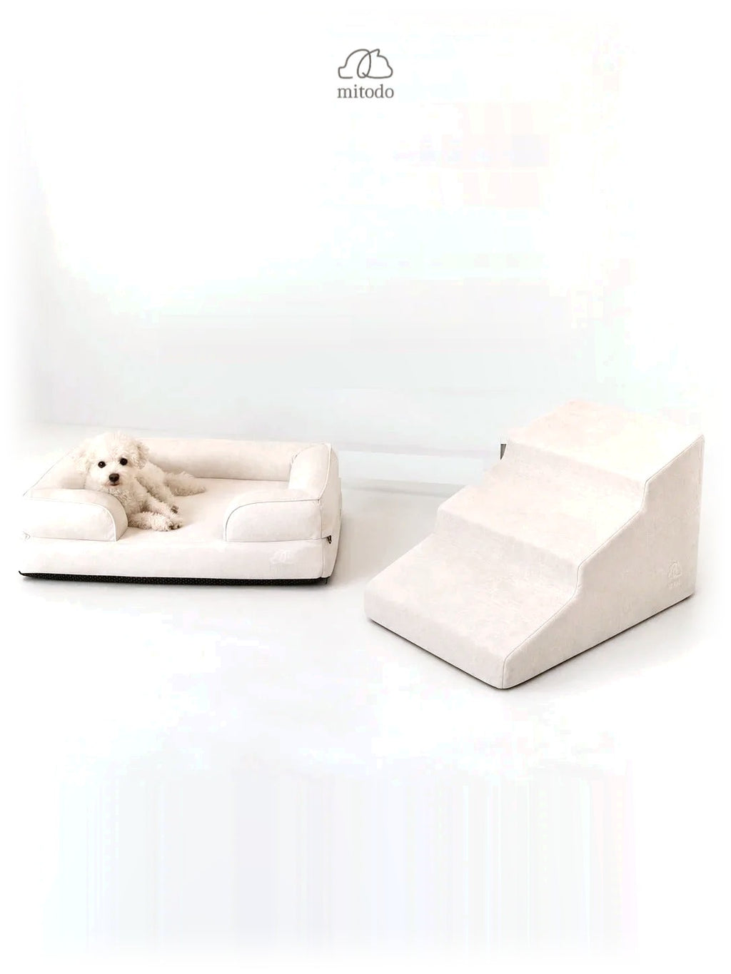 Mitodo Kumo Bed + Sora Stairs Set in Cream: Kumo orthopaedic bed with a dog resting, Sora pet stairs beside it