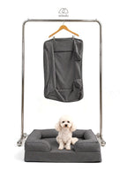 Mitodo Kumo Bed + Spare Cover Set: a Kumo bed with a matching spare cover hanging on a rail above, and a white poodle sitting in the bed
